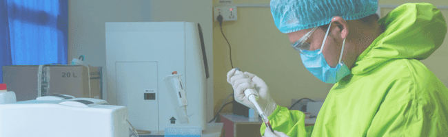 Healthcare worker tests a blood sample